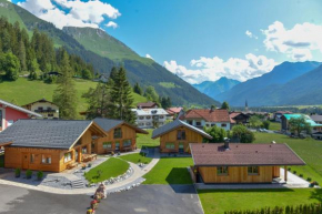 Гостиница Ferienhütten Lechtal Chalets  Эльбигенальп